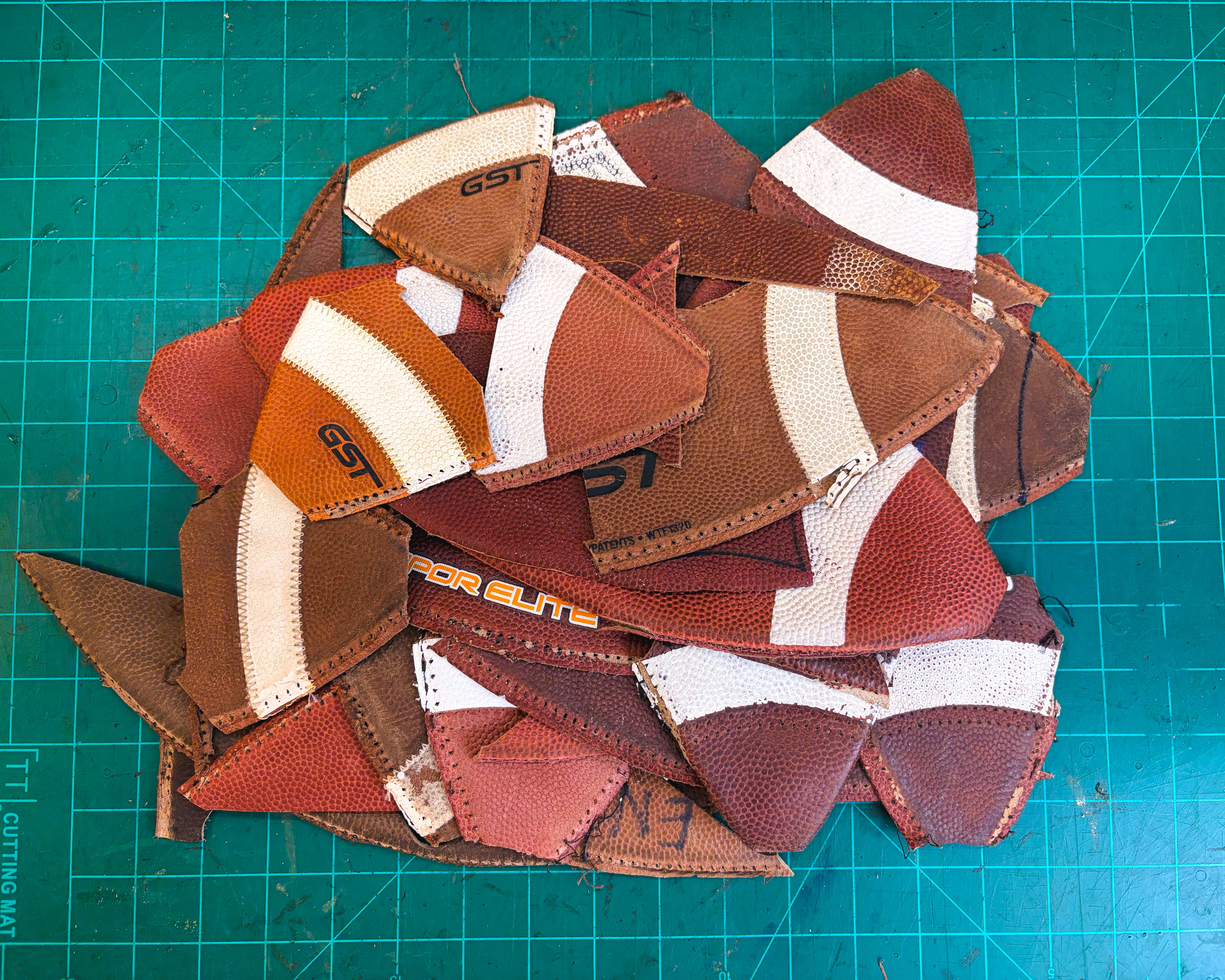 NCAA & NFHS Game-Used Football Scraps - 1 lb Variety Box